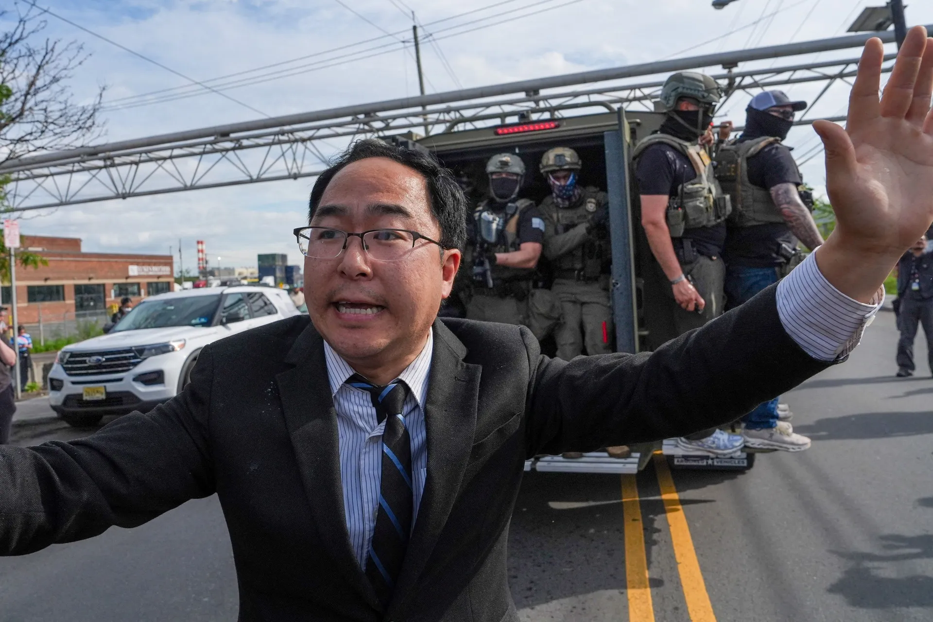 Democratic U.S. Senator Andy Kim tells protesters to let law enforcement officers leave, outside Delaney Hall in Newark, New Jersey, U.S., May 25, 2026. REUTERS/Ryan Murphy