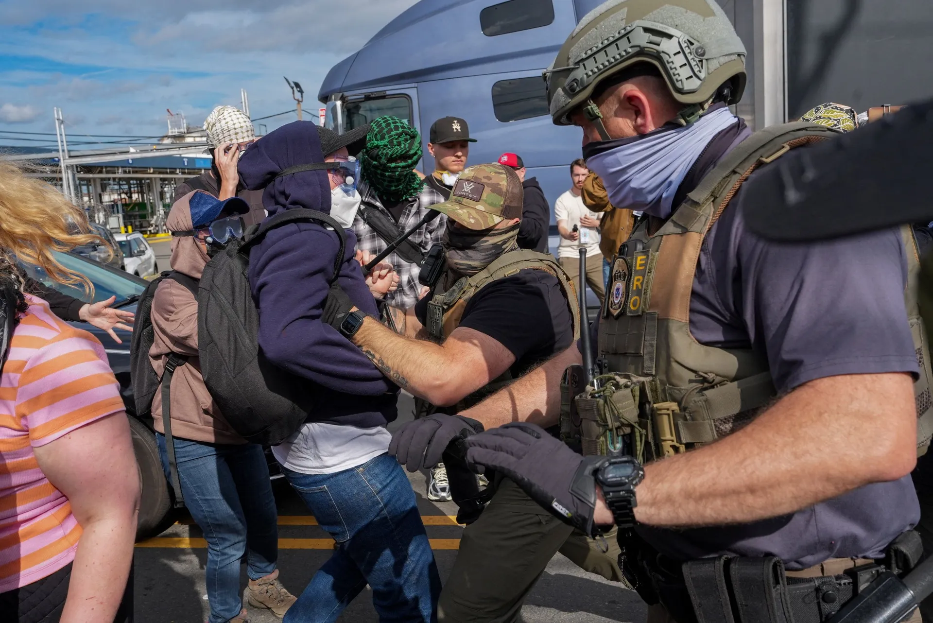 Protesters clash with law enforcement officers outside Delaney Hall in Newark, New Jersey, U.S., May 25, 2026. REUTERS/Ryan Murphy