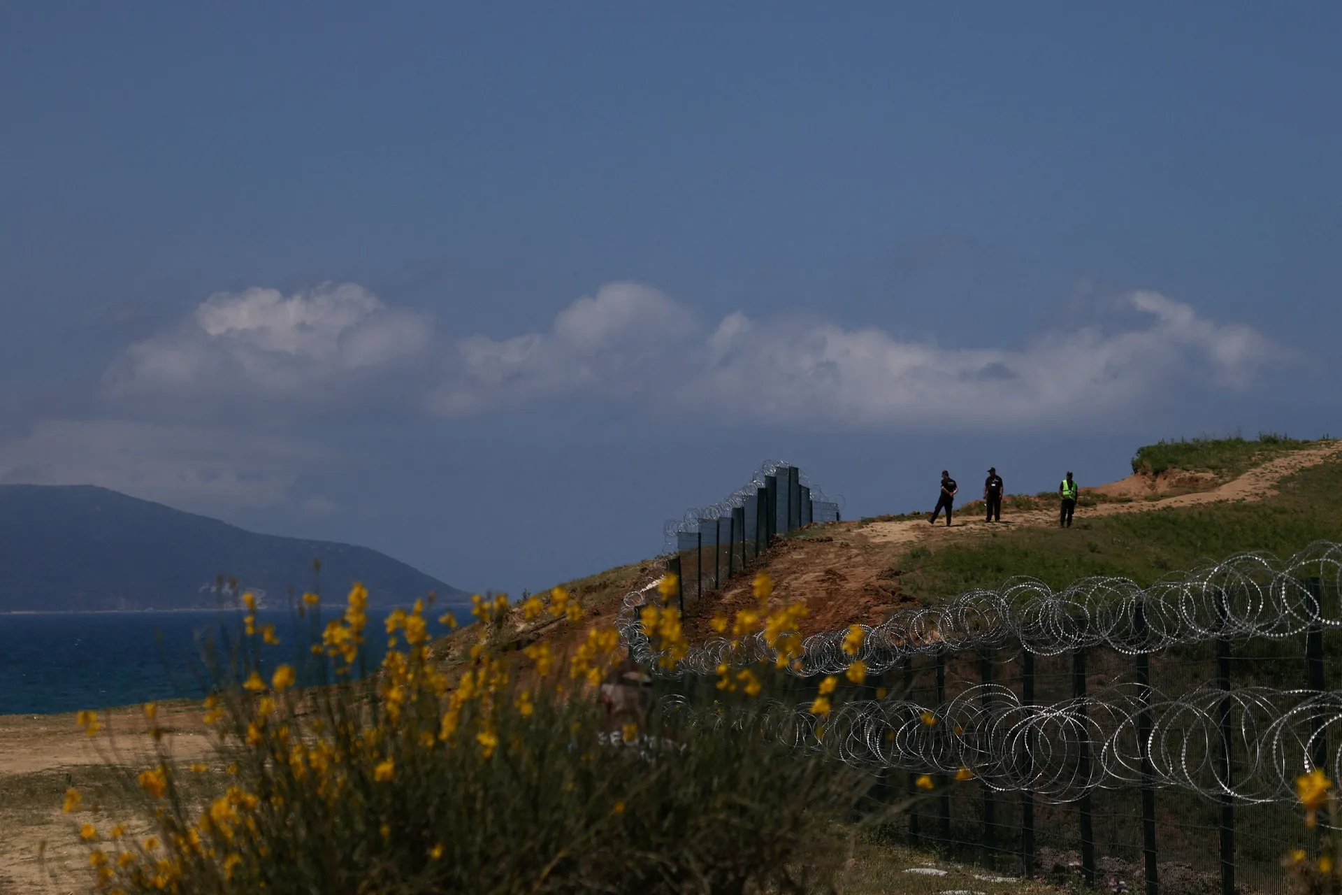 ZašPrivate security personnel operates at the Vjosa-Narte protected area where a luxury resort is planned by a company linked with Donald Trump's son-in-law Jared Kushner, near Vlora, Albania, May 30, 2026. REUTERS/Florion Goga      TPX IMAGES OF THE DAY