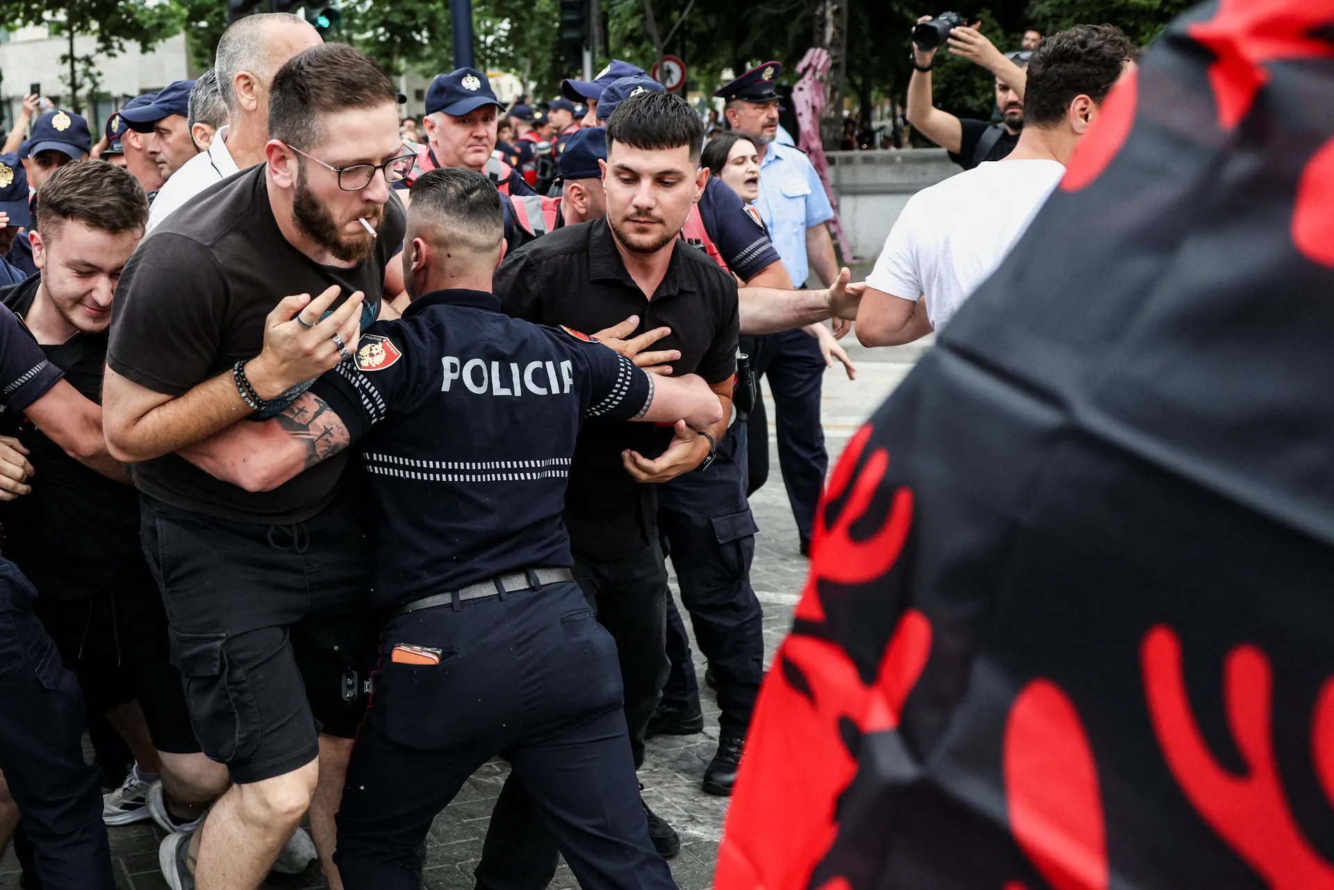 Demonstrators clash with police during a protest against a luxury resort, a plan by a company linked to Donald Trump's son-in-law, Jared Kushner, on an environmentally sensitive part of the Adriatic coast, in Tirana, Albania, June 3, 2026. REUTERS/Florion