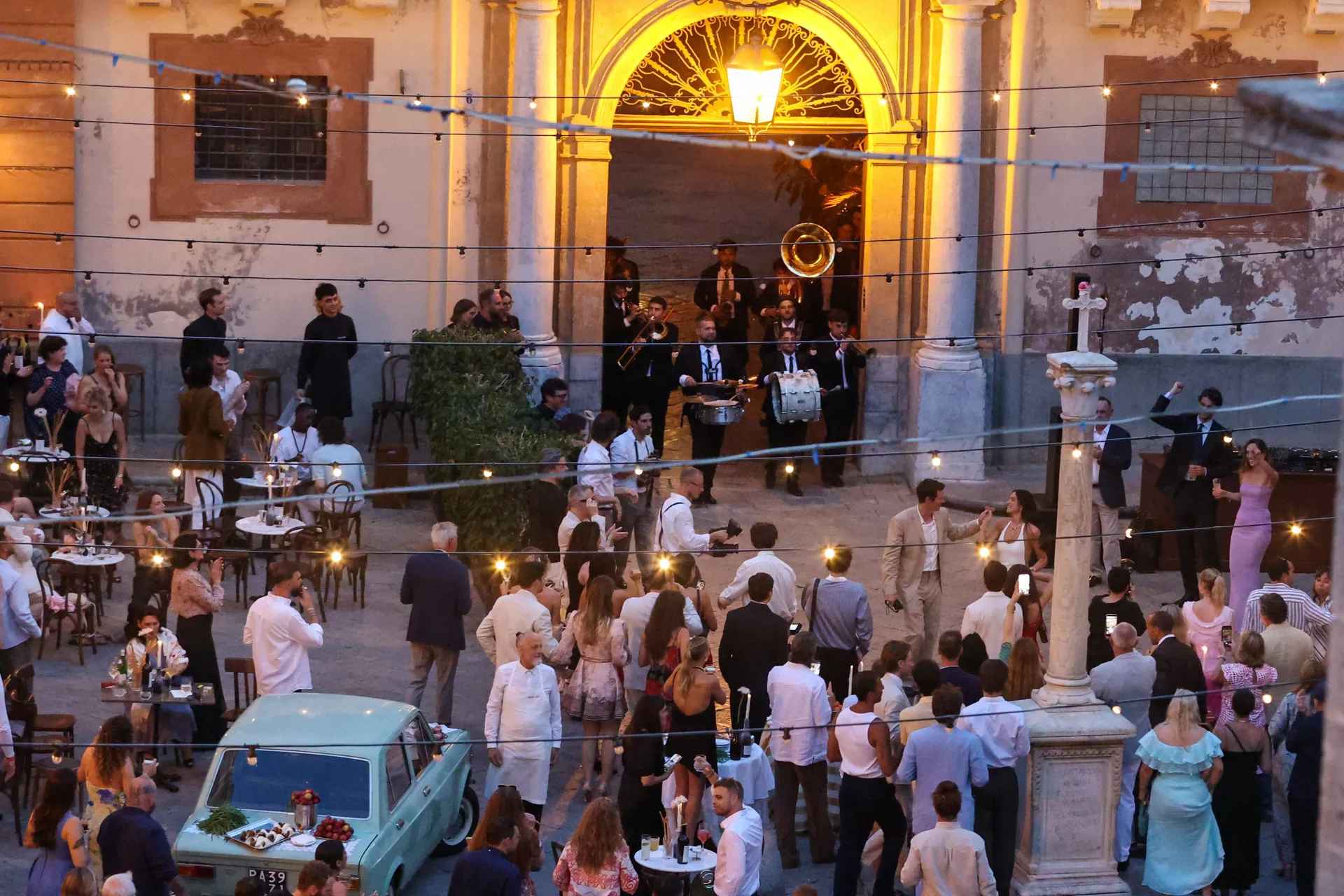 Singer Dua Lipa dances with her husband, actor Callum Turner, during wedding festivities following their marriage, in Palermo, Italy, June 5, 2026. REUTERS/Igor Petyx