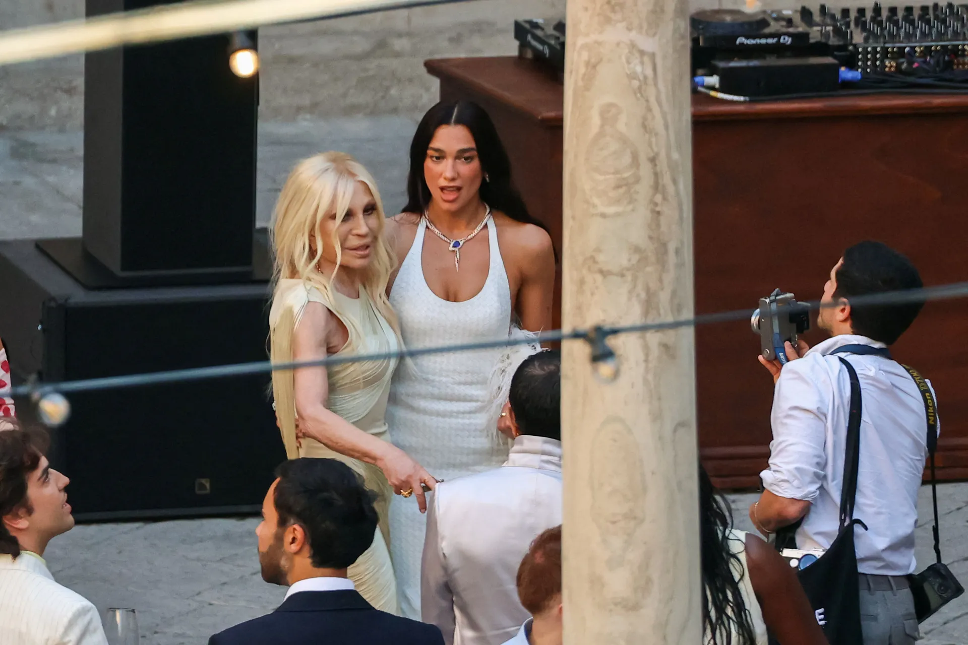 Singer Dua Lipa stands with designer Donatella Versace during wedding festivities following Lipa’s marriage to actor Callum Turner, in Palermo, Italy, June 5, 2026. REUTERS/Igor Petyx