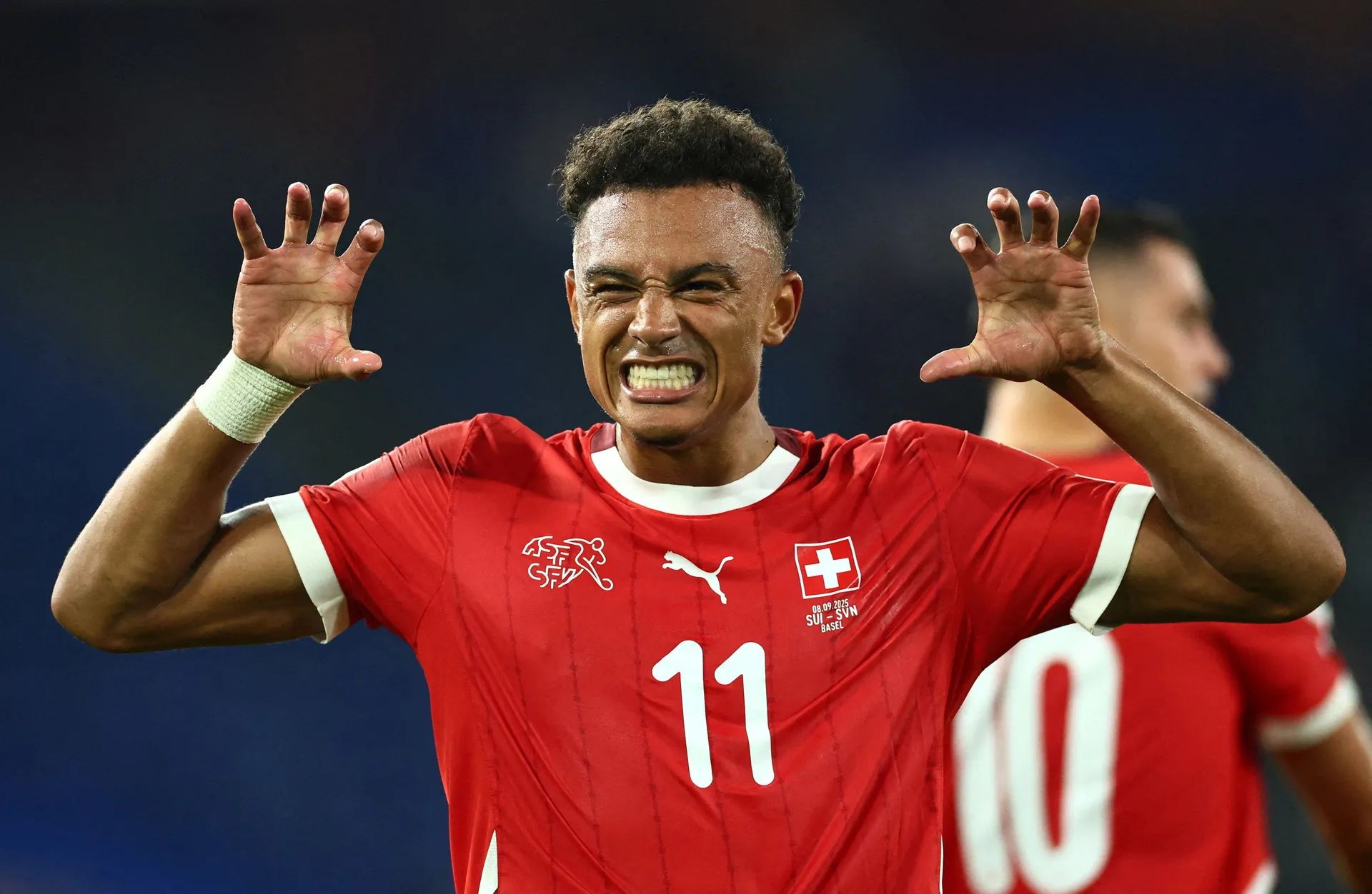 FILE PHOTO: Soccer Football - World Cup - UEFA Qualifiers - Group B - Switzerland v Slovenia - St. Jakob-Park, Basel, Switzerland - September 8, 2025 Switzerland's Dan Ndoye celebrates scoring their third goal REUTERS/Denis Balibouse/File Photo