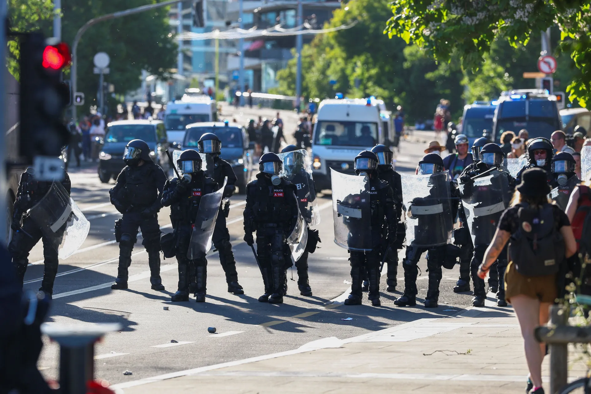 Riot police officers stand guard during a protest against the upcoming G7 summit in Evian-les-Bains in France, in Geneva, Switzerland, June 14, 2026. REUTERS/Denis Balibouse