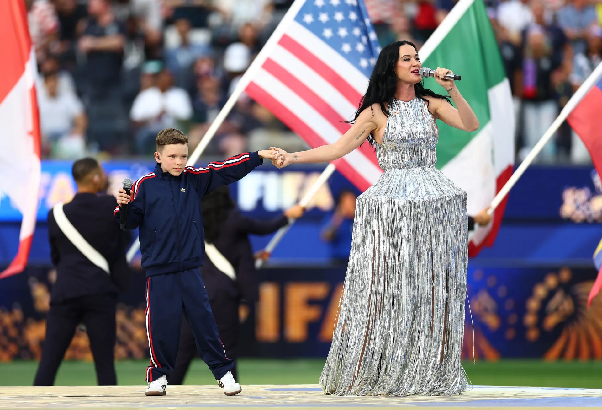 Soccer Football - FIFA World Cup 2026 - Group D - United States v Paraguay - Los Angeles Stadium, Inglewood, California, U.S. - June 12, 2026 Singers Katy Perry and Tius Luka perform during the opening ceremony before the match REUTERS/Lisi Niesner