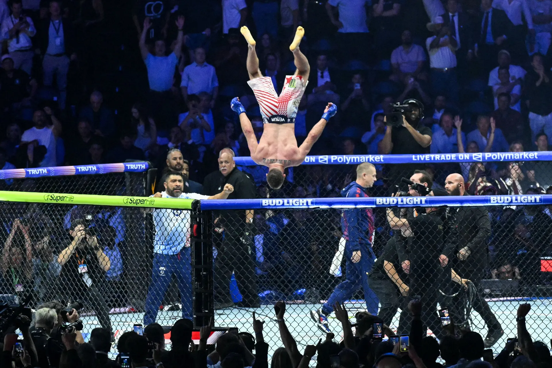 America's Justin Gaethje celebrates after defeating Ilia Topuria during "UFC Freedom 250" mixed martial arts event on the South Lawn of the White House in Washington, DC, in the early morning hours of June 15, 2026.     SAUL LOEB/Pool via REUTERS