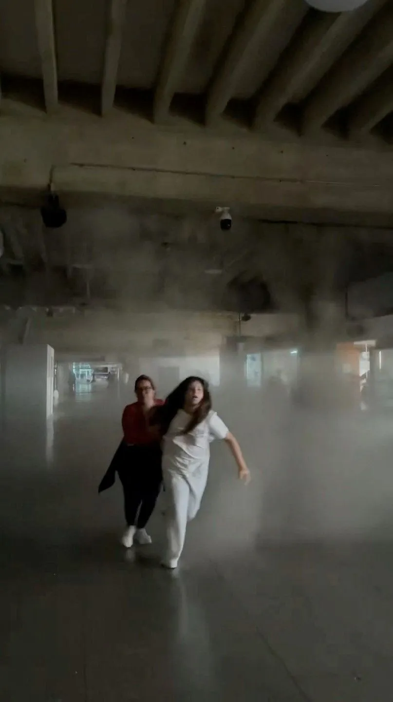 Two women run during an earthquake at Simon Bolivar International Airport in Maiquetia, Venezuela, June 24, 2026, in this still image obtained from a social media video. Wilmer Azuaje/via REUTERS THIS IMAGE HAS BEEN SUPPLIED BY A THIRD PARTY. MANDATORY C