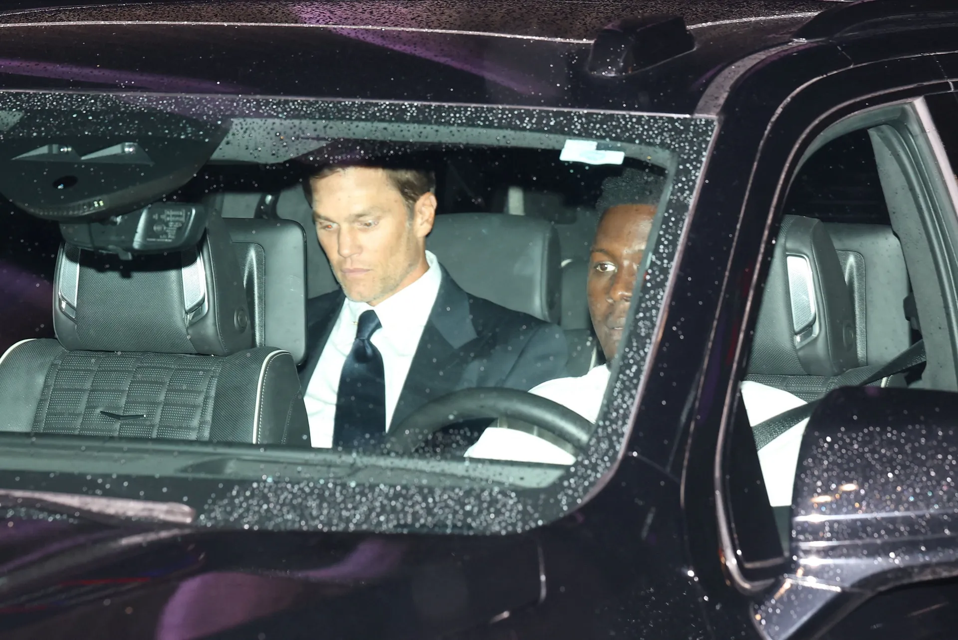 Tom Brady sits in a vehicle, on the day of the wedding celebrations of singer Taylor Swift and National Football League (NFL) player Travis Kelce at Madison Square Garden, in New York, U.S., July 3, 2026. REUTERS/Carlos Barria