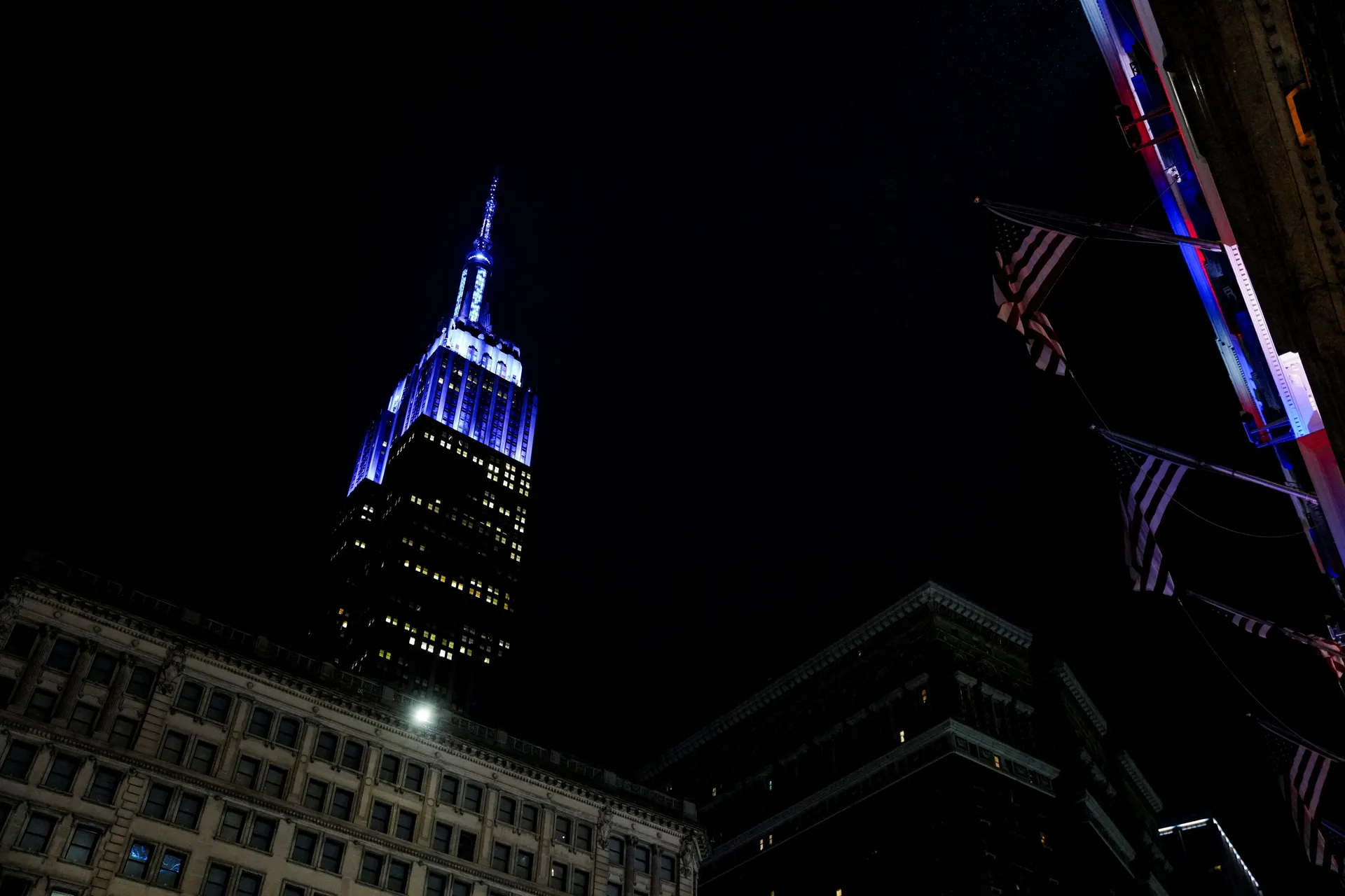 The Empire State Building is illuminated in blue to mark the wedding of singer Taylor Swift and National Football League (NFL) player Travis Kelce, in New York, U.S., July 3, 2026.  REUTERS/Angelina Katsanis     TPX IMAGES OF THE DAY