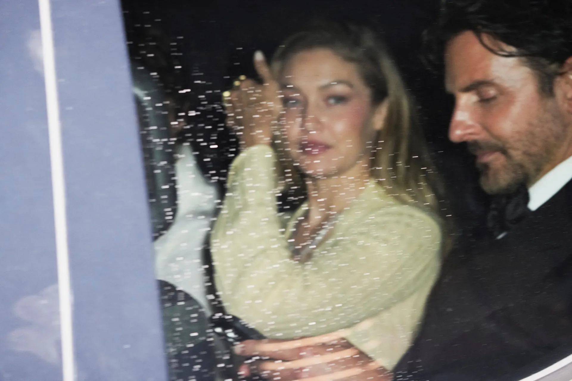 Gigi Hadid and Bradley Cooper depart Madison Square Garden, the venue for the wedding celebrations of singer Taylor Swift and National Football League (NFL) player Travis Kelce, in New York, U.S., July 4, 2026.  REUTERS/Bing Guan