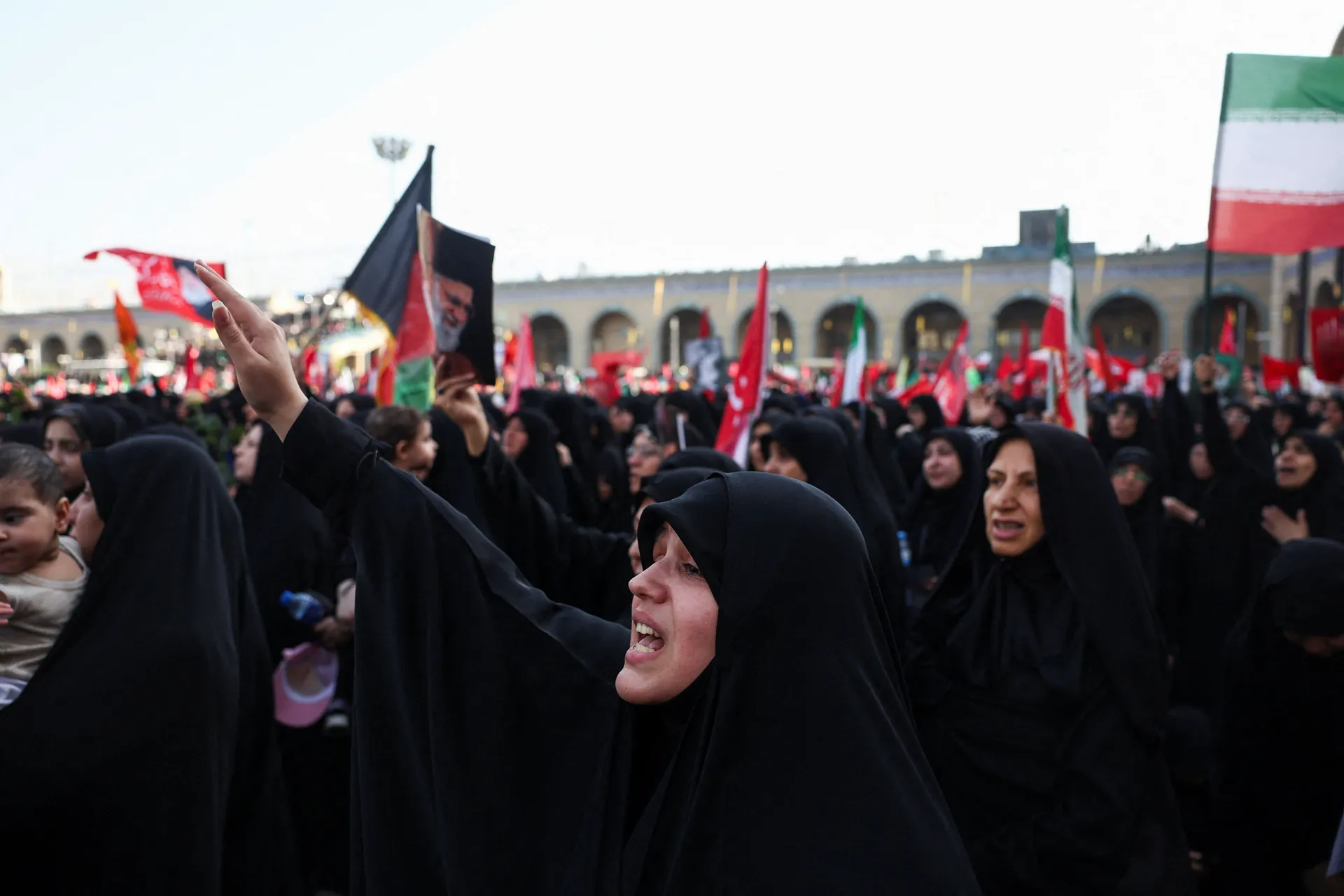 A woman reacts as mourners gather on the day of a public farewell ceremony to pay their respects to late Supreme Leader Ayatollah Ali Khamenei, who was killed on February 28 in Israeli and U.S. airstrikes, at the Imam Khomeini Grand Mosalla, in Tehran, Ir