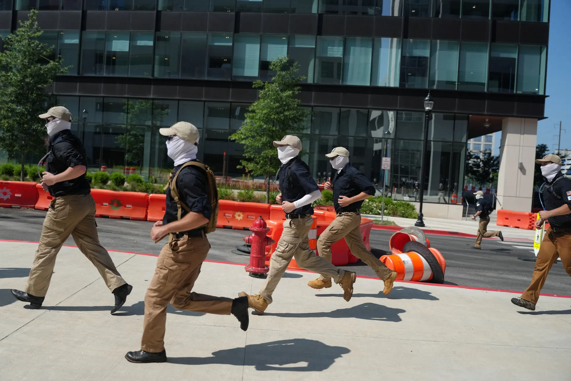 Members of the Patriot Front group run near a metro station, on the 250th anniversary of U.S. independence, in New Carrollton, Maryland, U.S., July 4, 2026. REUTERS/Nathan Howard