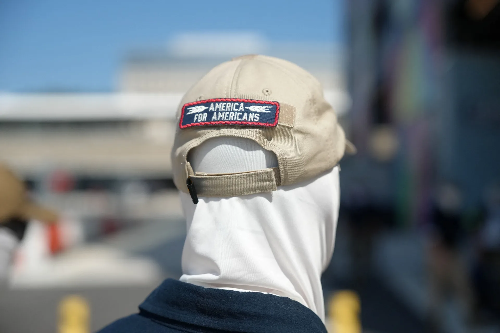 A member of the Patriot Front group stands near a metro station, on the 250th anniversary of U.S. independence, in New Carrollton, Maryland, U.S., July 4, 2026. REUTERS/Nathan Howard