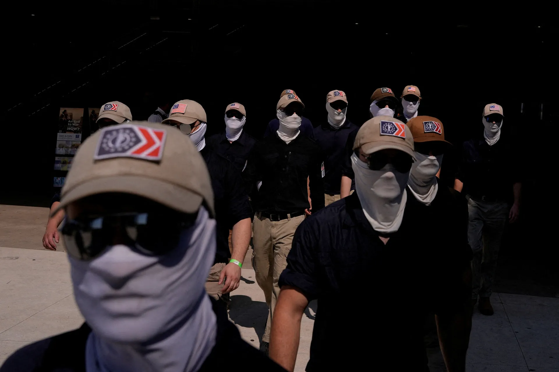 Members of the group Patriot Front exit a metro station, on the 250th anniversary of U.S. independence in New Carrollton, Maryland, U.S, July 4, 2026. REUTERS/Cheney Orr    REFILE - CORRECTING LOCATION FROM "WASHINGTON, D.C" TO "NEW CARROLLTON, MARYLAND".
