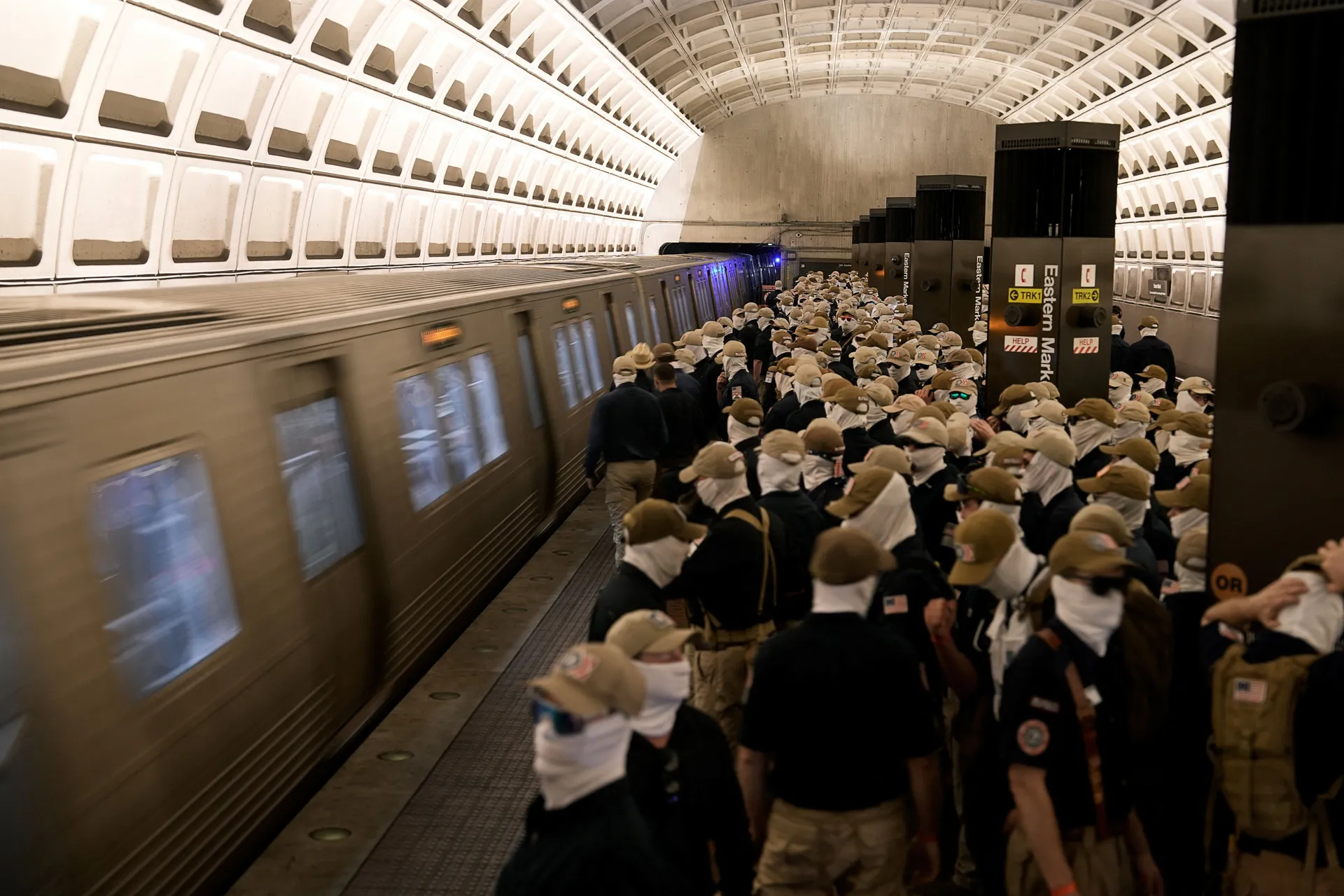 Members of the group Patriot Front wait to board the Metro, on the 250th anniversary of U.S. independence in Washington, D.C., U.S., July 4, 2026. REUTERS/Cheney Orr