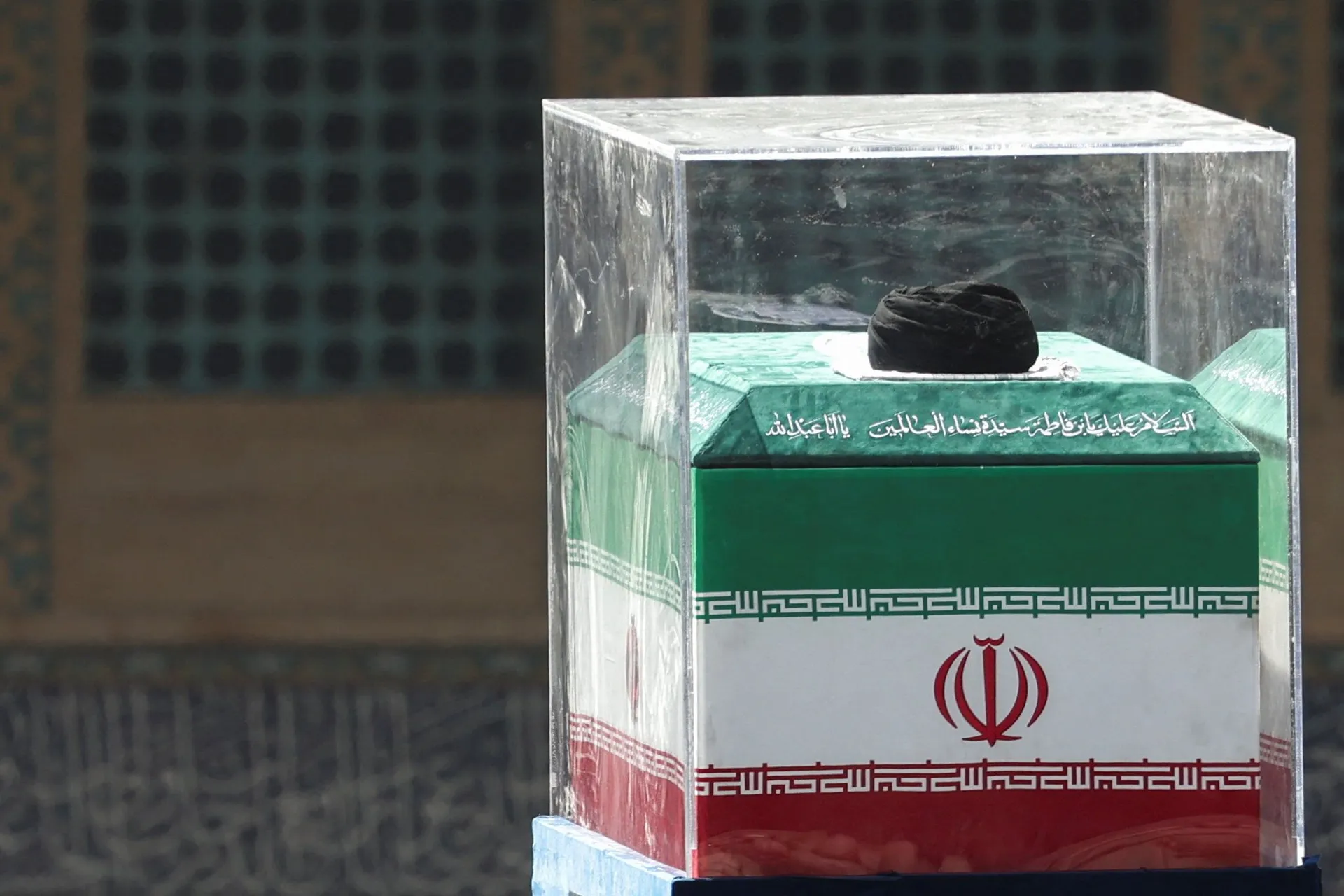 A turban is placed over the coffin of Iran's late Supreme Leader Ayatollah Ali Khamenei on stage, as people gather for a public farewell ceremony to pay their respects to late Supreme Leader Ayatollah Ali Khamenei, who was killed on February 28 in Israeli