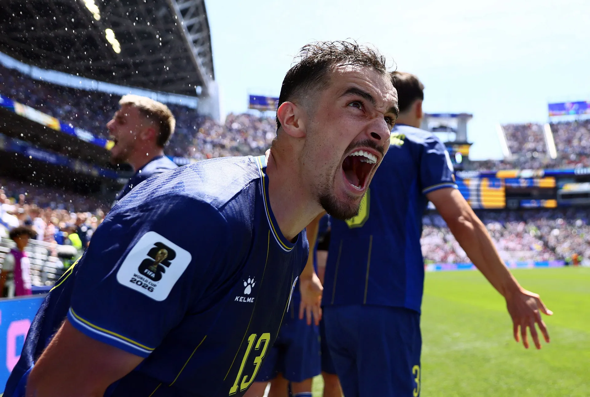 Soccer Football - FIFA World Cup 2026 - Group B - Bosnia and Herzegovina v Qatar - Seattle Stadium, Seattle, Washington, U.S. - June 24, 2026 Bosnia and Herzegovina's Ivan Basic celebrates their third goal scored by Ermin Mahmic IMAGN IMAGES via Reuters/B