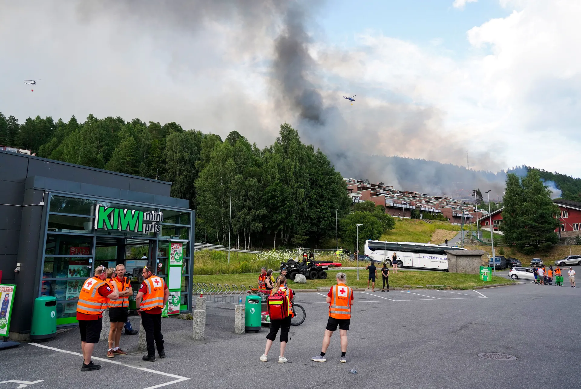 Smoke rises from a large fire that has spread from terraced houses in Krokstadelva, Drammen municipality, Norway, July 17, 2026. More than 50 homes were destroyed by fire on Friday near the city of Drammen in southern Norway as firefighters battled to con