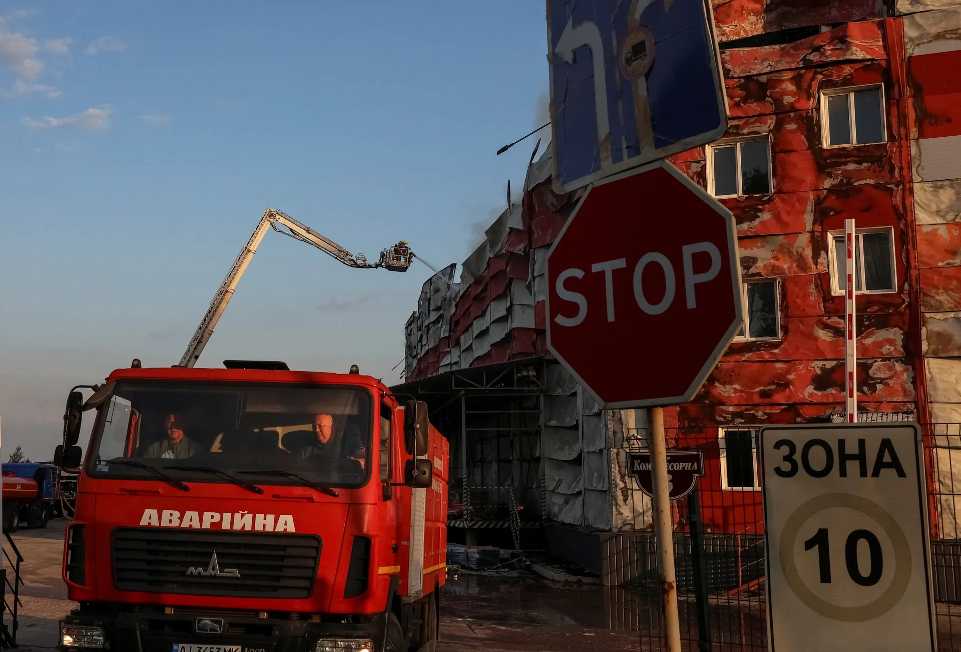 Firefighters work at the site of a Russian missile strike, amid Russia's attack on Ukraine, in Kyiv region, Ukraine July 19, 2026. REUTERS/Anatolii Stepanov