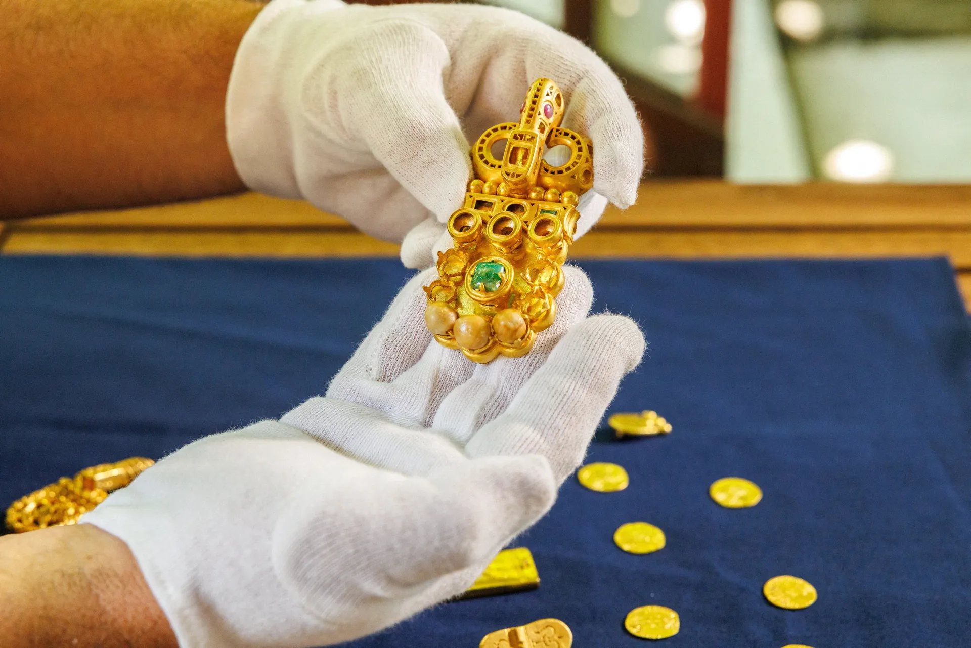 Igor Miholjek, head of research, Croatian Conservation Institute, Department of Underwater Archaeology, shows the gold buckle decorated with rubies, emeralds, and pearls, which they found in a Byzantine shipwreck near Polace on the island of Mljet, Croati