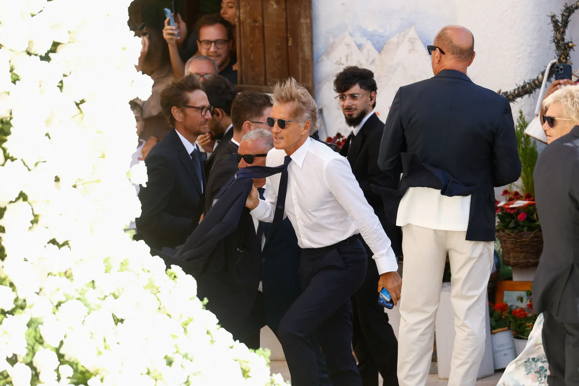 Former Italy coach Roberto Mancini arrives for the wedding of Manchester City goalkeeper Gianluigi Donnarumma and Alessia Elefante at the Church of San Giorgio Martire in Locorotondo, Italy, July 24, 2026. REUTERS/Alessandro Garofalo