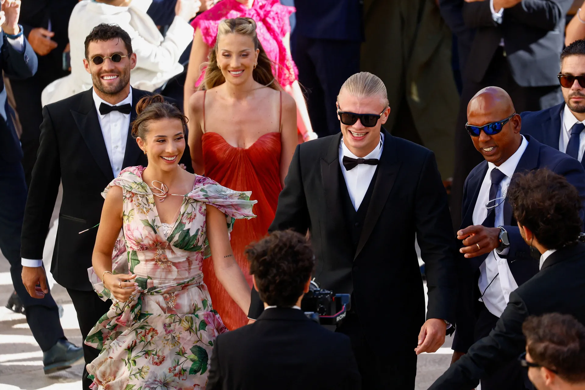 Manchester City forward Erling Haaland and his partner Isabel Haugseng Johansen arrive for the wedding of his teammate Manchester City goalkeeper Gianluigi Donnarumma and Alessia Elefante at the Chiesa Madre di San Giorgio Martire in Locorotondo, Italy, J