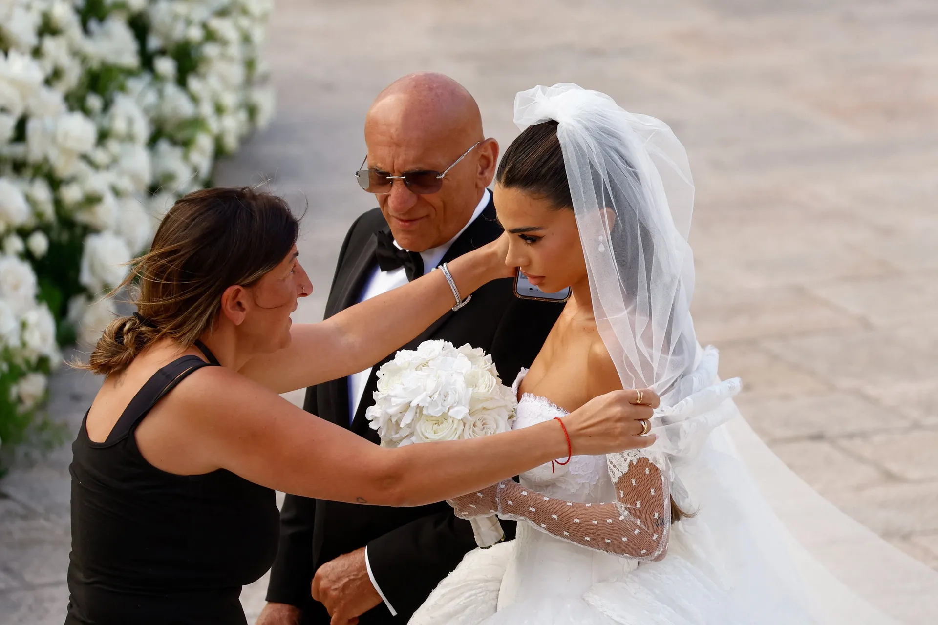 Alessia Elefante arrives for her wedding to Manchester City goalkeeper Gianluigi Donnarumma at the Chiesa Madre di San Giorgio Martire in Locorotondo, Italy, July 24, 2026. REUTERS/Alessandro Garofalo