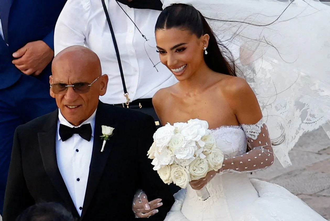 Alessia Elefante arrives for her wedding to Manchester City goalkeeper and Italy captain Gianluigi Donnarumma at the Chiesa Madre di San Giorgio Martire in Locorotondo, Italy, July 24, 2026. REUTERS/Alessandro Garofalo