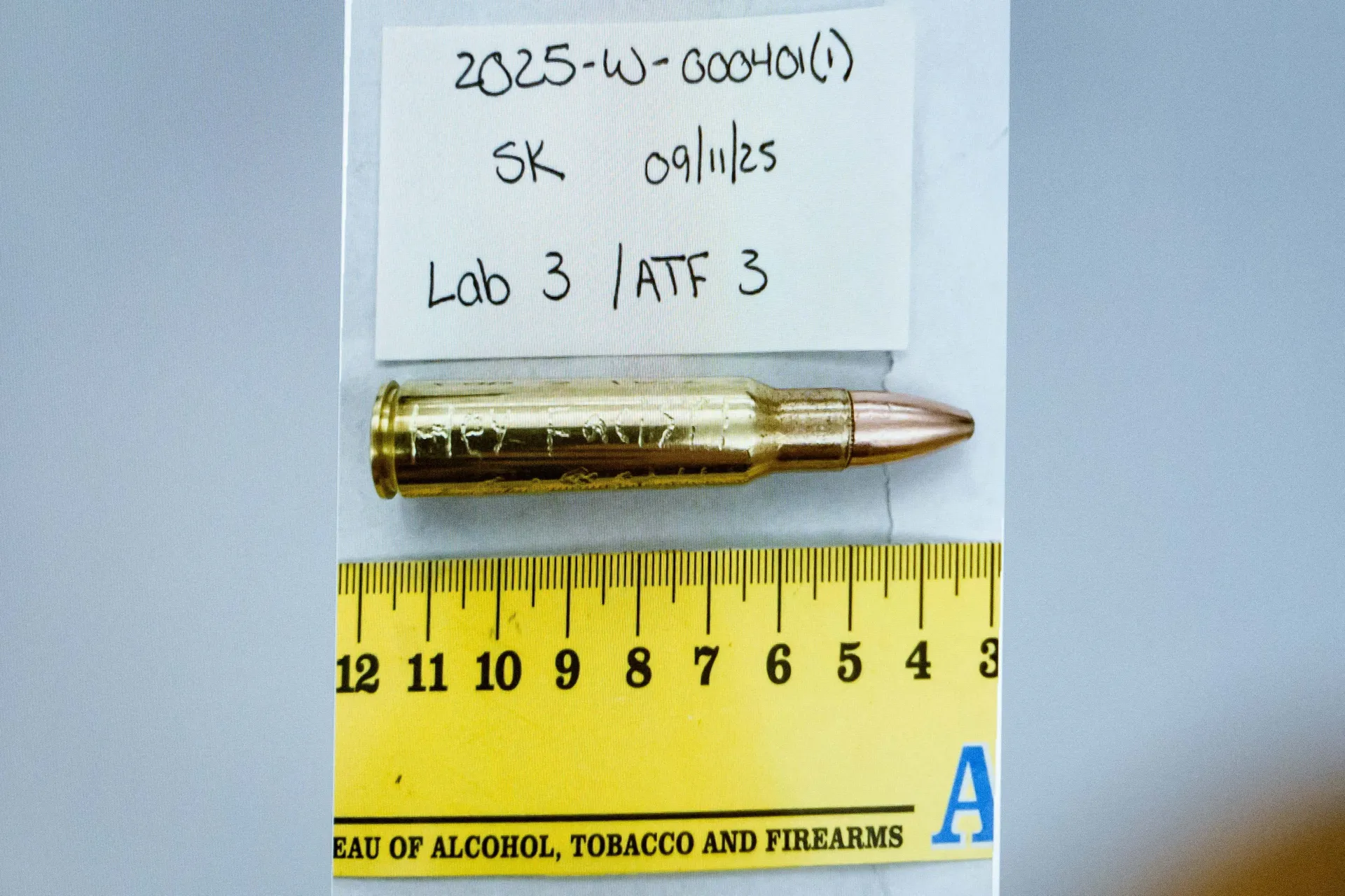 An image of a cartridge engraved with the words “Hey Fascist!” is displayed during a preliminary hearing for Tyler Robinson, the Utah man accused of fatally shooting Charlie Kirk, at the 4th District Court in Provo, Utah, U.S., July 9, 2026. Spenser He