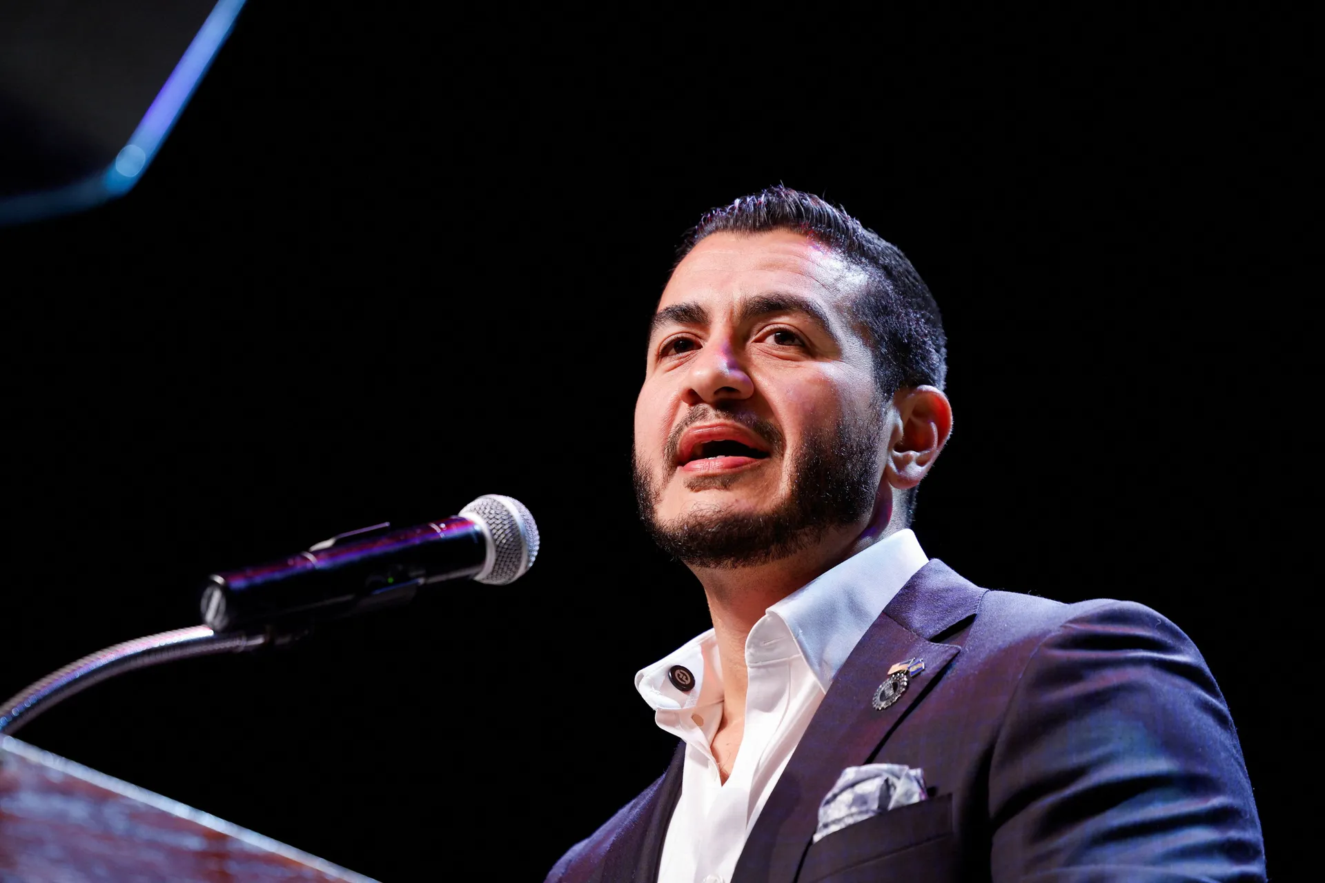 U.S. Senate Democratic candidate Abdul El-Sayed speaks on stage, with vote counting continuing for Michigan's Democratic U.S. Senate primary, during an election night rally in Detroit, Michigan, U.S., August 5, 2026. REUTERS/Rebecca Cook