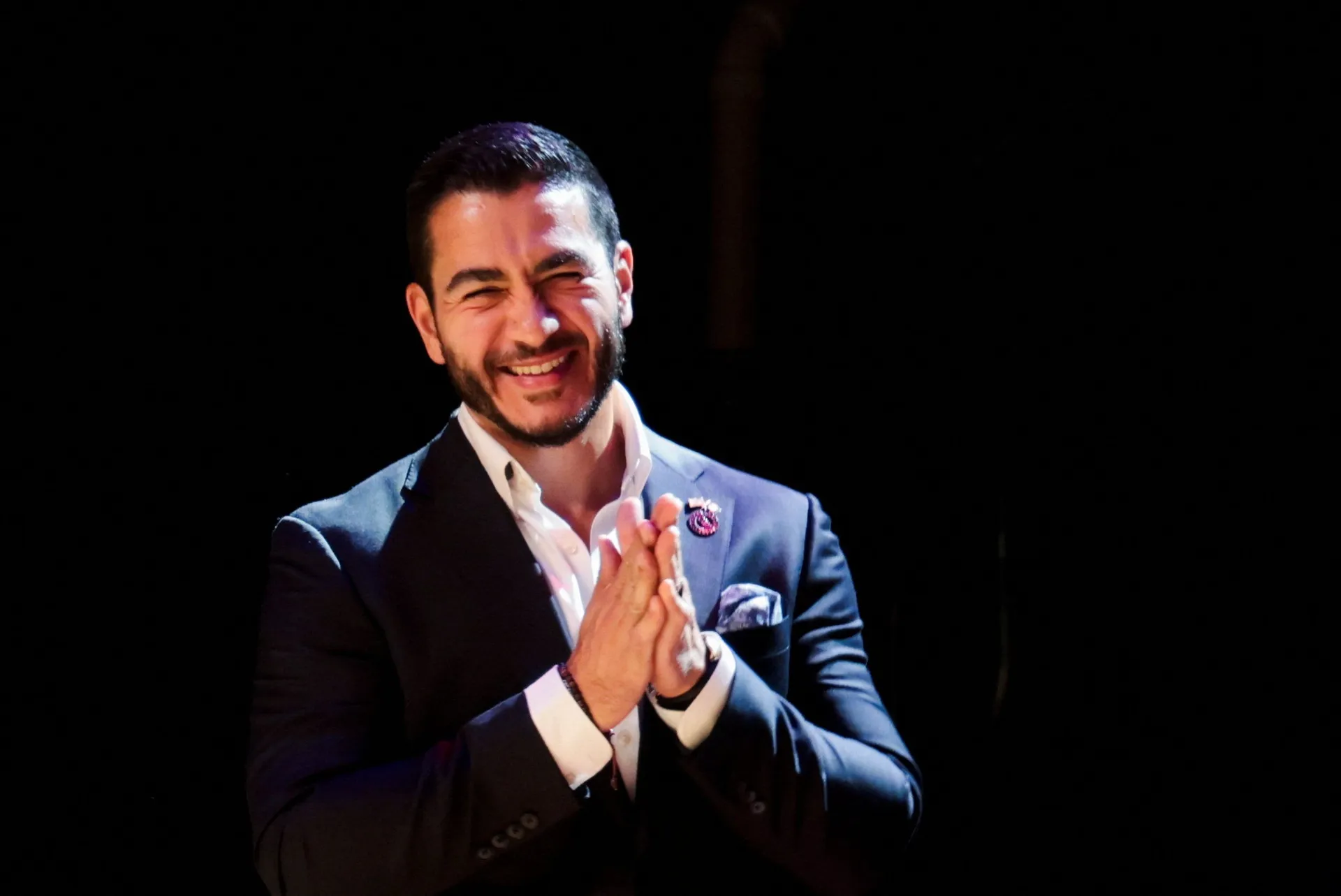 U.S. Senate Democratic candidate Abdul El-Sayed appears on stage, with vote counting continuing for Michigan's Democratic U.S. Senate primary, during an election night rally in Detroit, Michigan, U.S., August 5, 2026. REUTERS/Rebecca Cook