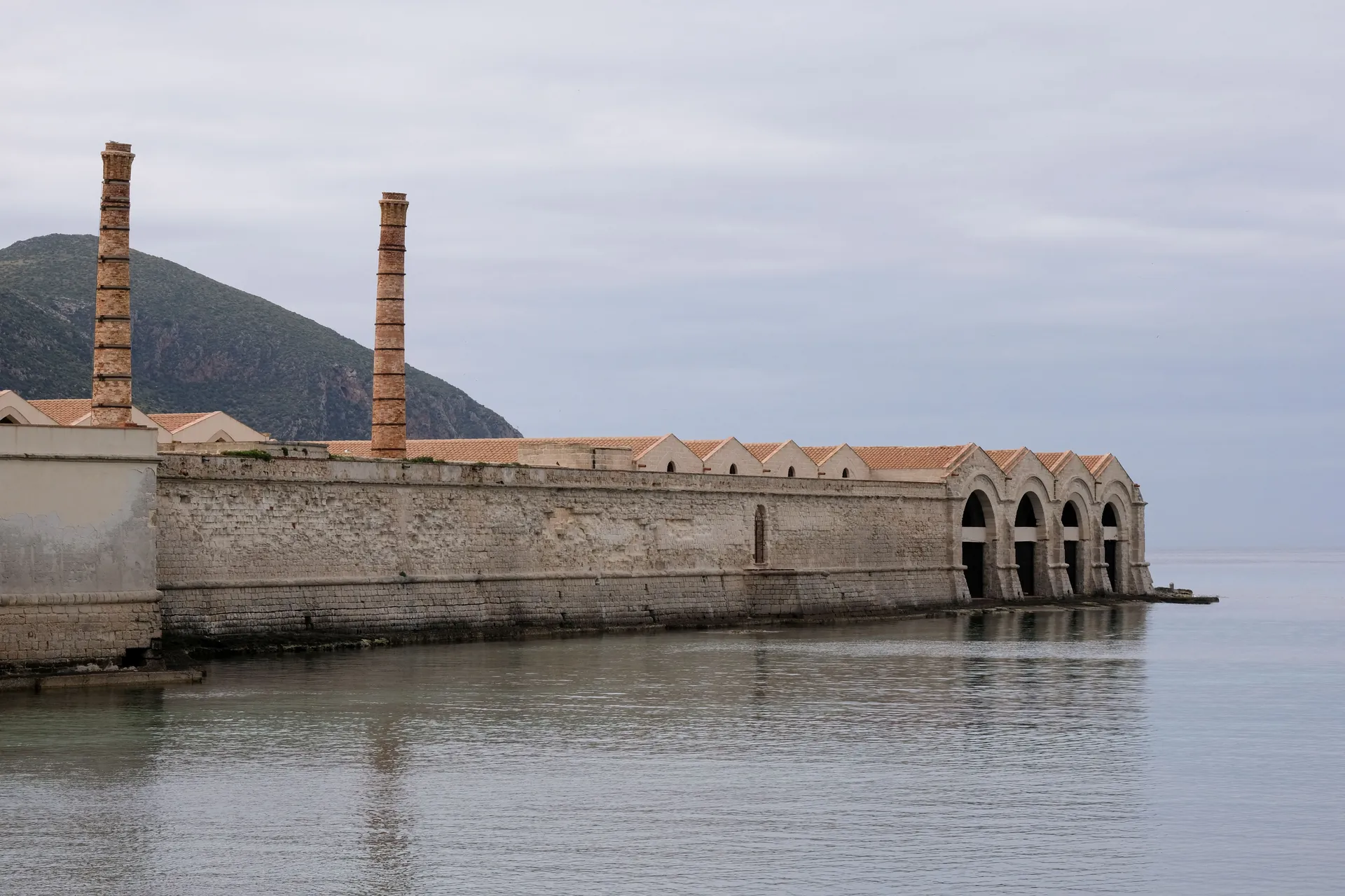 The former Florio tuna-processing plant lines the waterfront in Favignana, Italy, May 5, 2021. Favignana was used as a filming location for Christopher Nolan’s "The Odyssey", released in Italy on July 16, 2026. REUTERS/Igor Petyx