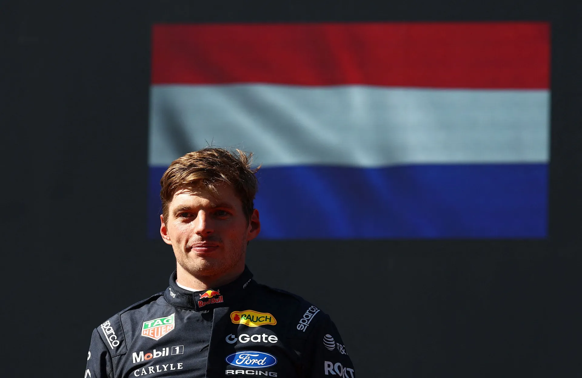 Formula One F1 - Spanish Grand Prix - Madring, Madrid, Spain - September 13, 2026 Red Bull's Max Verstappen celebrates on the podium after finishing second in the Spanish Grand Prix REUTERS/Albert Gea
