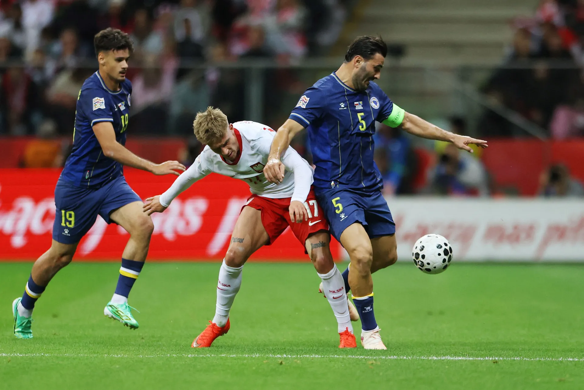 Soccer Football - Nations League - Group H - Poland v Bosnia and Herzegovina - PGE Narodowy, Warsaw, Poland - September 25, 2026 Poland's Michal Skoras in action with Bosnia and Herzegovina's Sead Kolasinac REUTERS/Kacper Pempel