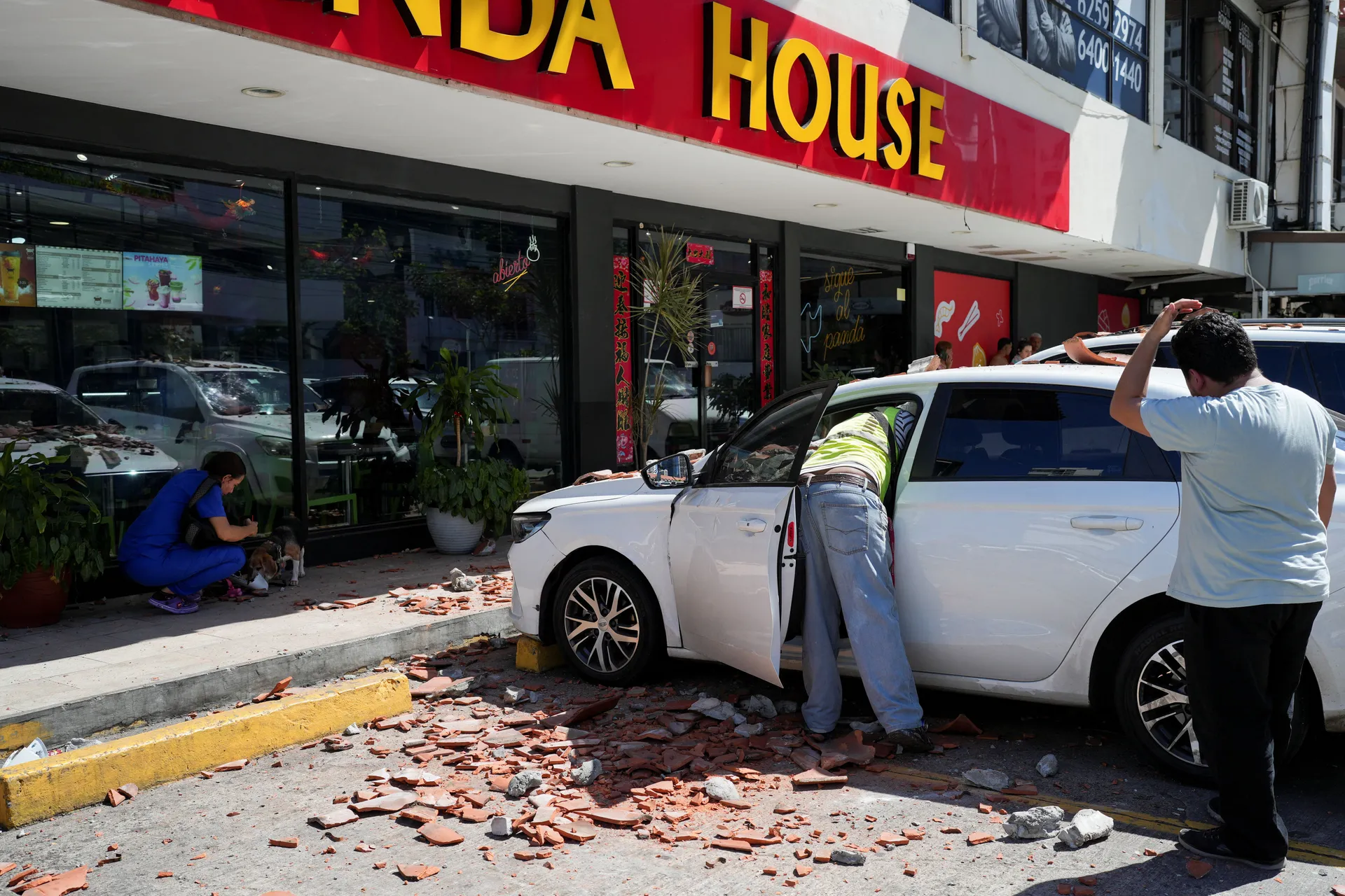A car damaged by falling debris after an earthquake struck near the southern coast of Panama, in Panama City, Panama, October 9, 2026. REUTERS/Enea Lebrun