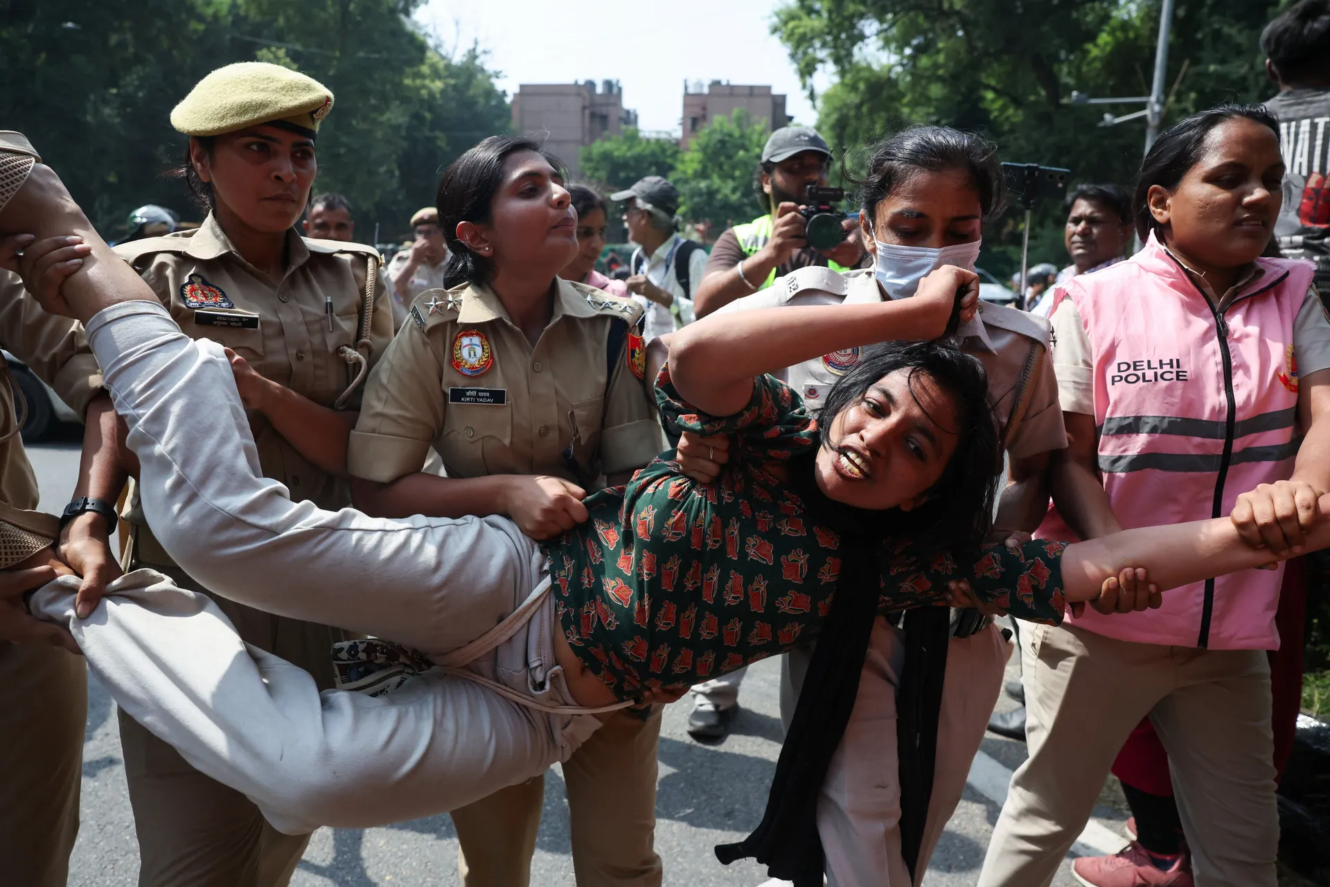 A protester is detained by security personnel during a protest by the Cockroach Janta Party (CJP) seeking the resignation of India's Chief Election Commissioner Gyanesh Kumar, near the protest site in New Delhi, India, October 10, 2026. REUTERS/Bhawika Ch