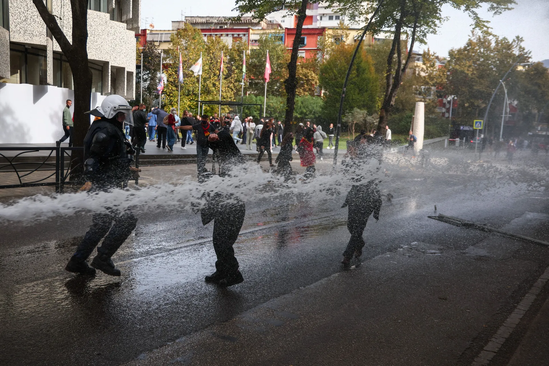 Police spay demonstrators with water amid an anti-government protest by students, in Tirana, Albania, October 15, 2026. REUTERS/Florion Goga